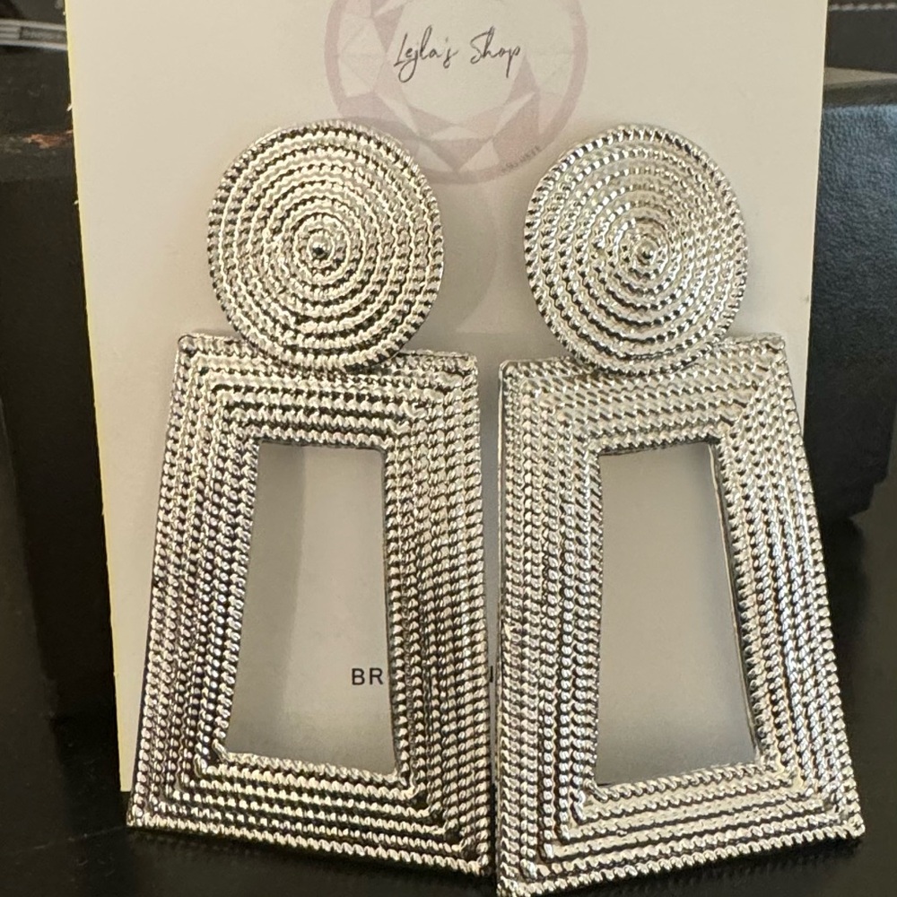 Woman’s silver fashion earrings